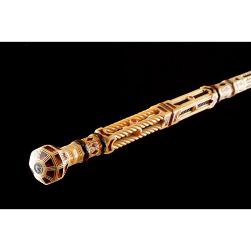 A Superb English Sailors Scrimshaw Carved Walrus Tusk and Whalebone Architectural Walking Cane